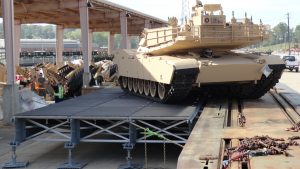 The side-load capability function of the new Rapidly Available Interface for trans-Loading, or RAIL, a modular ramp system prototype sponsored by U.S. Transportation Command, is one of three configurations the system offers for massing of combat power at the point of need without the requirement of shipping it to a fixed railhead facility for offload and then onward movement. Two RAIL kits are being shipped for use in real-world operations at the request of the 21st Theater Sustainment Company of U.S. Army Europe and Africa, which asked that eight more kits be produced. (U.S. Army courtesy photo)