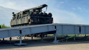 Army engineers assemble a Rapidly Available Interface for Trans-loading (RAIL) system at Coleman Barracks in Mannheim, Germany in May of 2022. The system is enroute to support recovery efforts of four missing U.S. Soldiers in Prabade, Lithuania.