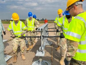 Army engineers assemble a Rapidly Available Interface for Trans-loading (RAIL) system at Coleman Barracks in Mannheim, Germany in May of 2022. The system is enroute to support recovery efforts of four missing U.S. Soldiers in Prabade, Lithuania.